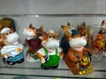 New Year`s souvenirs on the shelf, different bulls