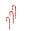 New Year\'s sticks candy canes with stripes on a white isolated background