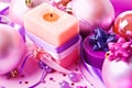 New Year's still-life with a candle in violet Royalty Free Stock Photo