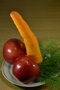 New Year`s still life of two apples and carrots. Royalty Free Stock Photo