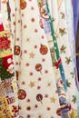 New Year`s textiles, fabric with a Christmas print pattern. Vertical background