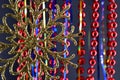 New Year\'s toy snowflake out of focus on a blurred background of New Year\'s tinsel