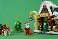 New Year's toy. Winter house of Santa Claus. Lego constructor bricks details. Christmas story and minifigures