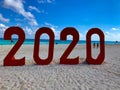 New Year sign on the beach welcoming 2020