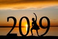 2019 New Year Silhouette of Ballet Girl at Golden Sunset Royalty Free Stock Photo