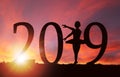 2019 New Year Silhouette of Girl Dancing at Golden Sunrise Royalty Free Stock Photo