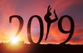 2019 New Year Silhouette of Girl Dancing at Golden Sunrise Royalty Free Stock Photo