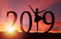 2019 New Year Silhouette of Girl Dancing at Golden Sunrise Royalty Free Stock Photo