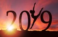 2019 New Year Silhouette of Girl Dancing at Golden Sunrise Royalty Free Stock Photo