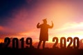 2020 New year Silhouette young man graduation in 2020 years education congratulation concept ,Freedom and Happy new year Royalty Free Stock Photo