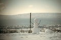 New year snowman from snow with shovel. Royalty Free Stock Photo