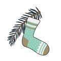 New Year sock with patterns and a Christmas tree branch