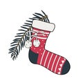 New Year sock with patterns and a Christmas tree branch