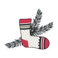 New Year sock with patterns and a Christmas tree branch