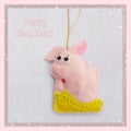 New year. Soft toy made of felt. The cute pig. Piggy gets out of the bag. Christmas tree decoration. Symbol of year. 2019.