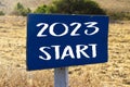 New year 2023 or start straight concept.word 2023 written on road sign. Concept of challenge or career path and change Royalty Free Stock Photo