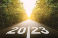 The new year 2023 or straightforward concept. Text 2023written on the road