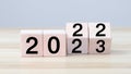 2022, 2023 New year target plan with woodblocks cubes on wooden table