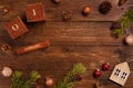 New Year template. Wooden calendar, balls, spruce branches, cones, on dark wooden  background Royalty Free Stock Photo