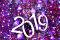New year 2019 text on colorful background, christmas tree, decoration and lights, holiday concept backdrop Royalty Free Stock Photo
