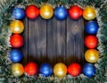 New year theme: christmas decoration and balls on dark retro wood background