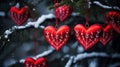 New year toys red hearts with a beautiful pattern on the green branches of the Christmas tree