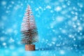 New Year tree on a blue background. Copy space. Place for text. Christmas, New Year background. Royalty Free Stock Photo