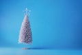 New Year tree on a blue background. Copy space. Place for text. Christmas, New Year background. Royalty Free Stock Photo