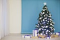 New year tree on Christmas garlands on blue blue white background Royalty Free Stock Photo