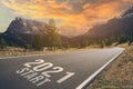 New Year 2021 the way to go concept. 2021 Start written on the asphalt ground Royalty Free Stock Photo