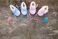 2023 new year written laces of children`s shoes and pacifier on old wooden background. Top view. Flat lay. Space for text Royalty Free Stock Photo