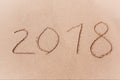 2018 New Year Written at the Sand Beach. Royalty Free Stock Photo