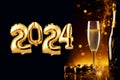 2024 New Year's celebration with champagne and golden balloons in the shape of 2024. New Year's party invitation Royalty Free Stock Photo