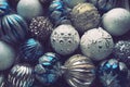 New Year's Christmas balls and decorations close up. A lot of decoration of golden, blue, yellow, white, silver Royalty Free Stock Photo