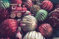 New Year's Christmas balls, tinsel and decorations close up. A lot of decoration of golden, red, yellow, green