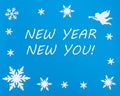 New Year's motivational card. Text NEW YEAR NEW YOU on a blue background with Christmas snowflakes, a white angel