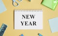 New year new you text on notepad with office Royalty Free Stock Photo