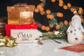 New years and christmas deco, written its xmas time on wooden desk