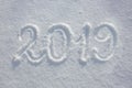 New years date 2019 written in snow. Winter background.