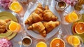 New Years Day Brunch Buffet with Croissants, Eggs, Ham, and Orange Juice