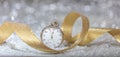 New Years eve celebration party. Minutes to midnight on an old watch, bokeh festive background Royalty Free Stock Photo