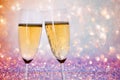 New Years eve concept with bokeh, fireworks and glasses of champagne Royalty Free Stock Photo