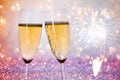 New Years eve concept with bokeh, fireworks and glasses of champagne Royalty Free Stock Photo