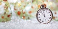 New Years eve countdown. Minutes to midnight on an old watch, bokeh background Royalty Free Stock Photo