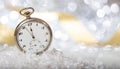 New Years eve countdown. Minutes to midnight on an old watch, bokeh festive