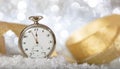 New Years eve countdown. Minutes to midnight on an old watch, bokeh festive Royalty Free Stock Photo