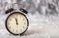 New Years eve countdown. Minutes to midnight on a vintage alarm clock Royalty Free Stock Photo