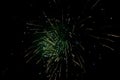 New Years Eve fireworks, several rockets exploding colourfully with many sparks in the night sky Royalty Free Stock Photo