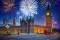 New years fireworks display over the Big Ben and Westminster Bridge in London, UK Royalty Free Stock Photo