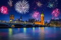 New years fireworks display over the Big Ben and Westminster Bridge in London, UK Royalty Free Stock Photo